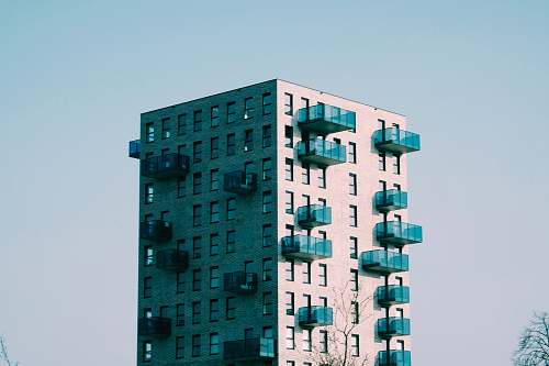 high rise brown concrete building town